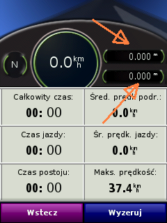 Komputer podróży, strzałki wskazują liczniki kilometrów.